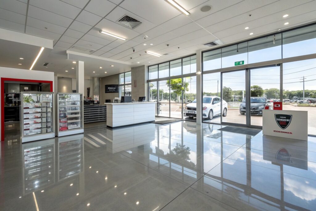 Commercial epoxy flooring installation Sunshine Coast for retail showroom with metallic finish