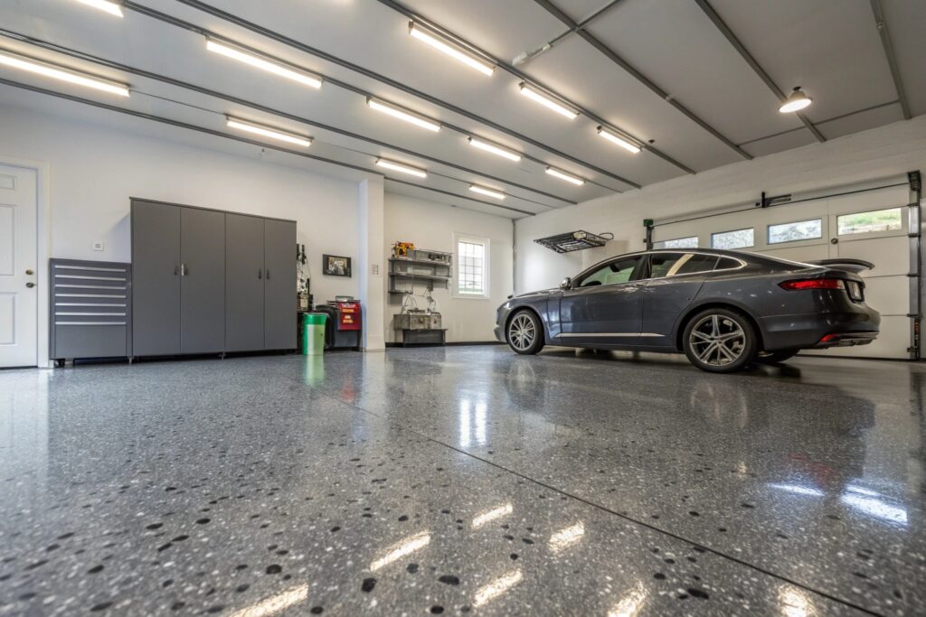 Professional epoxy garage floor coating Sunshine Coast with decorative flakes and high-gloss finish