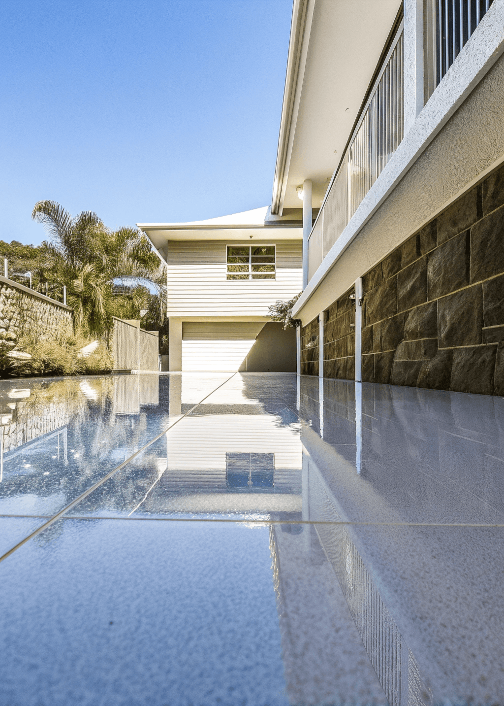 Wide-angle view of a completed epoxy garage floor in Warana
