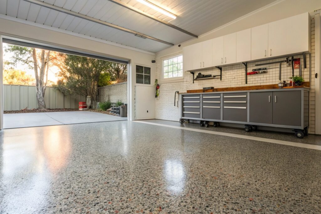 Organised Sunshine Coast garage with durable flake epoxy floor coating installed