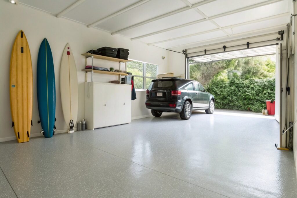 Organised coastal Queensland garage with durable epoxy flooring and surfboards on wall
