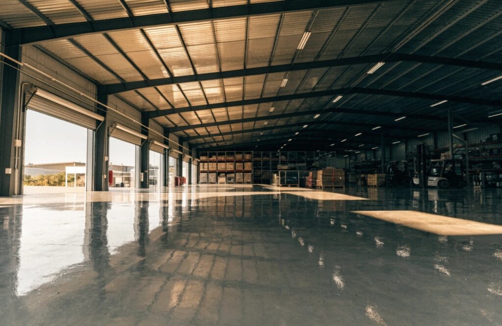 Commercial epoxy flooring in a Nambour warehouse facility